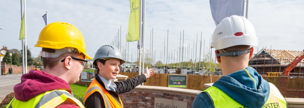 Construction Students, Employer Pointing In Distance
